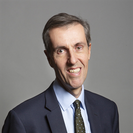 1:1 portrait of Andrew Selous