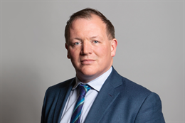 3:2 portrait of Damian Collins