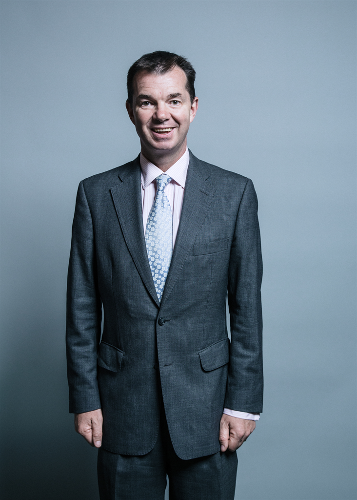 Full sized portrait of Guy Opperman