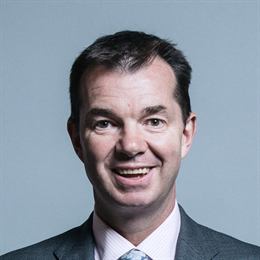 1:1 portrait of Guy Opperman
