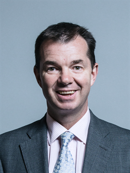 3:4 portrait of Guy Opperman