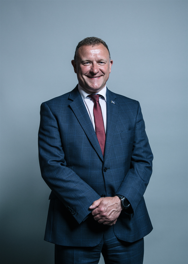 Full sized portrait of Drew Hendry