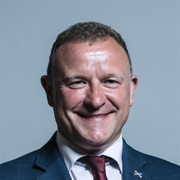1:1 portrait of Drew Hendry