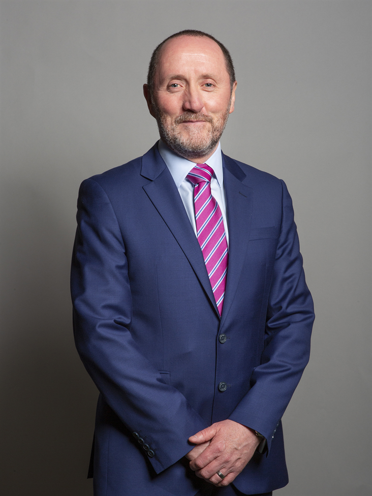 Full sized portrait of Eddie Hughes