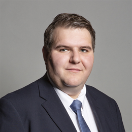 1:1 portrait of Dr Jamie Wallis
