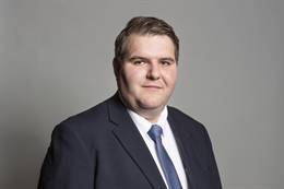 3:2 portrait of Dr Jamie Wallis