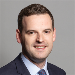 1:1 portrait of Paul Holmes