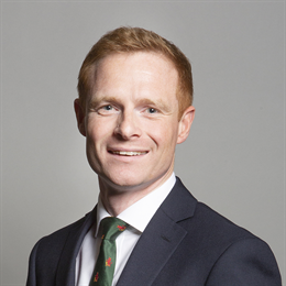 Robbie Moore M.P.