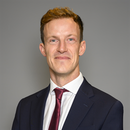 1:1 portrait of Alistair Strathern