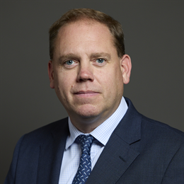 1:1 portrait of Charlie Dewhirst