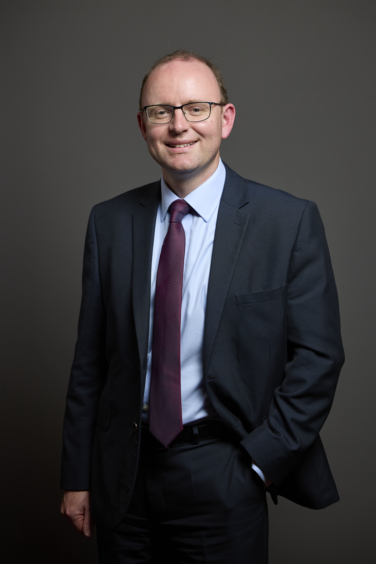Full sized portrait of Andrew Cooper