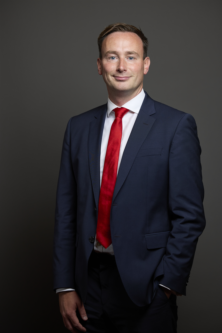 Full sized portrait of Tom Hayes