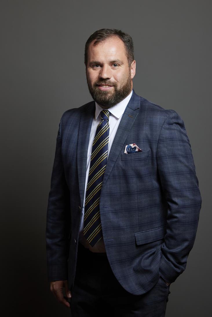 Full sized portrait of Sean Woodcock