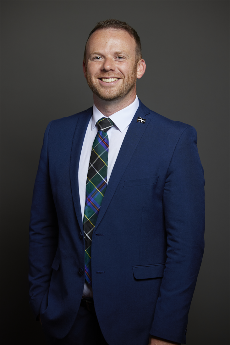 Full sized portrait of Ben Maguire