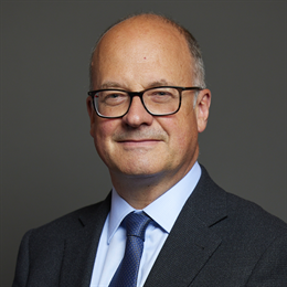 1:1 portrait of John Cooper