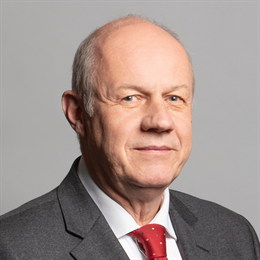 1:1 portrait of Damian Green
